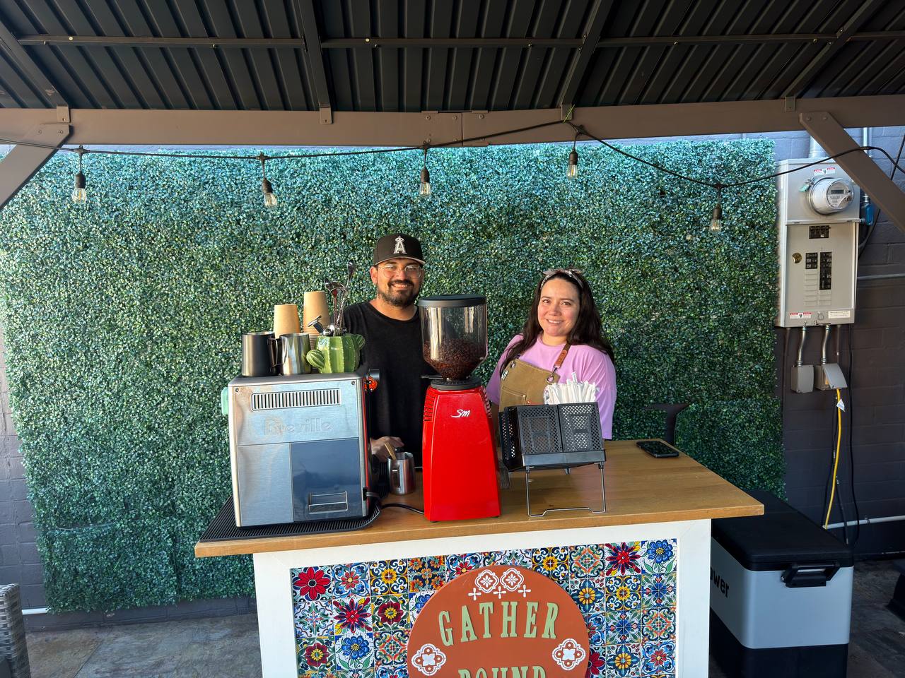 Gather Round Coffee team serving guests at the mobile cart